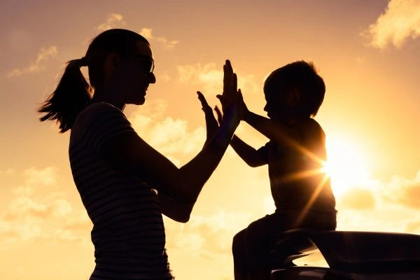 Image of happy mother and child after resolving child arrangements Guildford